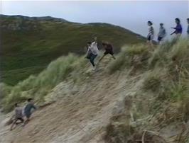 Paul and Lukas enjoy the sand dunes at Camusdarach Beach